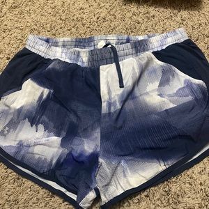 Navy blue athletic shorts with pockets